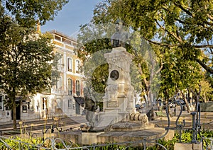 Monument to Eduardo Coelho, founder of the popular newspaer Diario de Noticias in 1864, located in Lisbon, Portugal. photo