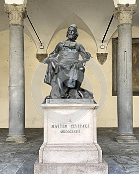 Monument to Matteo Civitali by Arnaldo Fazzi in the loggia of the Praetorian Palace in Lucca, Italy. photo