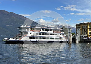 The Navigazione Laghi ferry Motonave Traghetto Plinio docking at Varenna from Lake Como