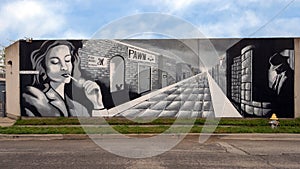 Mural by famous Deep Ellum artist Frank Campagna at the entrance to Deep Ellum self storage. photo