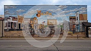 `Cowtown` by artist Stylle Read on the South side of Cavender`s on Main Street at the Forth Worth Stockyards.