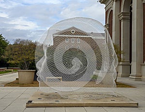 `Sho`, a painted stainless steel sculpture by Juame Plensa located outside the Meadows Art Museum in Dallas, Texas photo