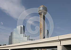 Reunion tower rising beside the Hyatt Regency on a bright sunny day in Dallas, Texas. photo