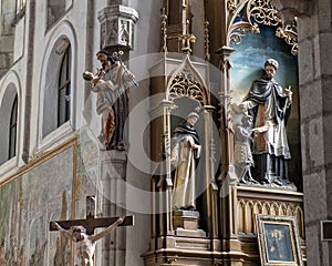 Saints and Jesus on the Cross Church of Saint Vitus, Cesky Krumlov, Czech Republic photo