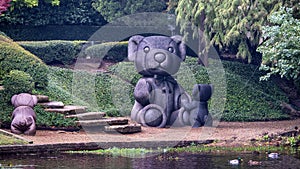 `Teddy Bears`, a sculpture by Jerry Williams on the West side of Exall Lake in Highland Park, Dallas, Texas