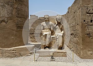 Statue of the god Amun-Re and his wife Mut just before the Colonnade Hall in Luxor Temple, Egypt.