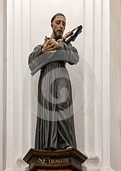 Saint Francis of Assisi statue in the Chapel of Santa Teresa in the Mosque-Cathedral of Cordoba in Spain.