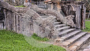 Stone dragon statues on the steps to the terrace of the garden of the Forbidden city, Imperial City, Citadel, Hue, Vietnam photo