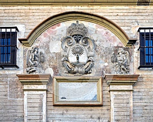 Relief on the front facade of the Puerta del Perdon on Alemanes Street in Seville, Spain. photo