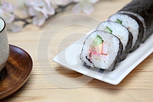 Sushi roll on a dish