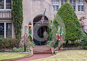 Two nutcrackers standing guard beside the front steps of an expensive home in Highland Park, Dallas County, Texas photo