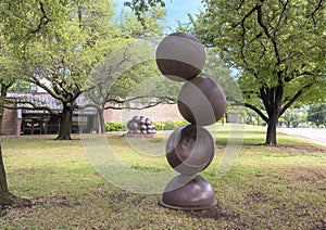 `Descending Spheres` and `Malthusian Conception` in front of the Lakewood Library in Dallas, Texas. photo