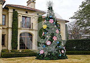 Large Christmas tree decorated with peppermint ornaments in Dallas, Texas photo