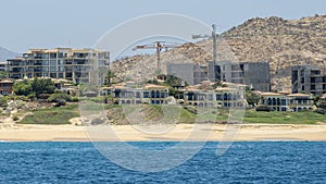 Concrete block construction along a beach in Cabo San Lucas. photo