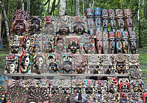 Painted wooden Mayan masks for sale in Chichen Itza