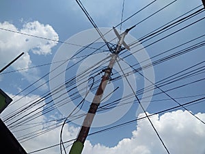 pictures of electricity poles on the edge of town