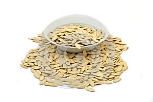 Pictures of pumpkin seeds on a plate photo