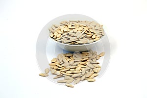 Pictures of pumpkin seeds on a plate photo