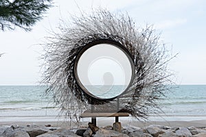 picturesqe bamboo round frame art work by the sea