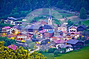 Picturesque alpine village of Tisens aerial evening view