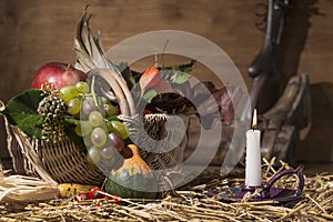 Picturesque autumn composition with basket, fruits, pumpkin, win