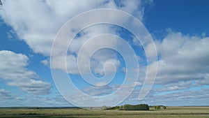 Picturesque autumn nature. Rural landscape with a field. Countryside. Timelapse.