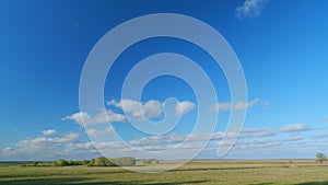 Picturesque autumn nature. Rural landscape with a field. Countryside. Timelapse.