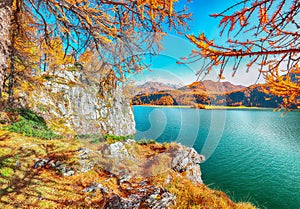 Picturesque autumn scene in Swiss Alps and views of Sils Lake (Silsersee