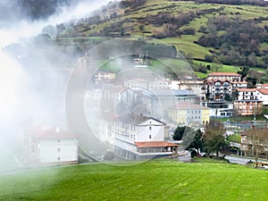 Picturesque Basque village of Aia in the province of Guipuzkoa, Spain shrouded in fog