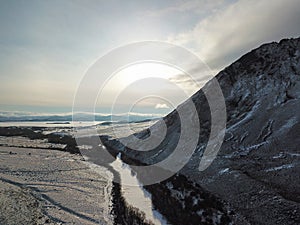 A picturesque bird\'s-eye view of the river in winter.