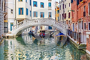 Picturesque canal with a gondola, Venice, Italy