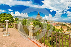 Picturesque cityscape of Messina viewed from a balcony with fence. One of the largest cities on the Island of Sicily, Italy