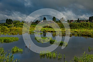 Picturesque cloud cover over the dacha village