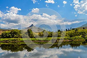 Picturesque cloud and mountain reflection landscape in Royal Natal National park Drakensberg South Africa