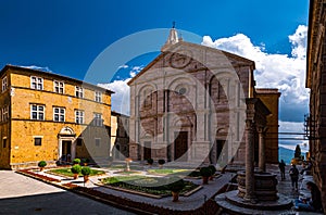 A picturesque corner with the Duomo di Santa Maria Assunta in Pienza, Italy