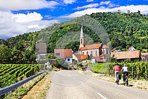 Beautiful Husseren le chateaux village,view with geometric vineyards and hill,Alsace region,France. photo