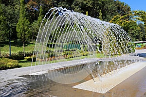 Picturesque dancing fountain Fountain show, creative water design Sofiivka. Uman, Ukraine