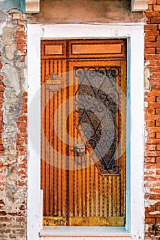 Picturesque door on brick wall