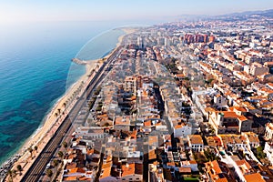 Drone view of Vilassar de Mar cityscape on Mediterranean coast, Spain photo