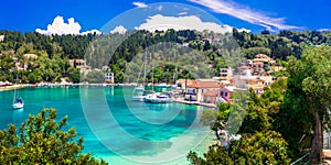 Picturesque fishing village Lakka in Paxos with turquoise sea, I photo