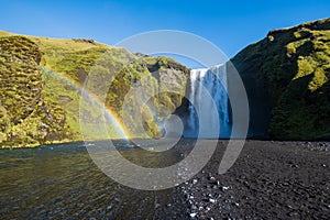 Picturesque full of water big waterfall Skogafoss autumn view, southwest Iceland