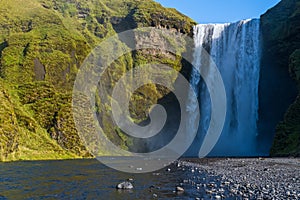 Picturesque full of water big waterfall Skogafoss autumn view, southwest Iceland