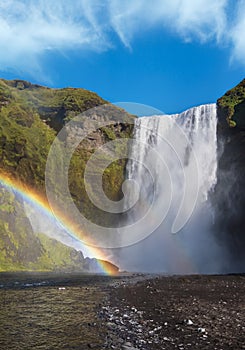 Picturesque full of water big waterfall Skogafoss autumn view, southwest Iceland