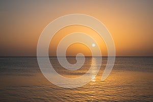 Picturesque golden sunset. Aerial ambient seascape. Peaceful seascape with sun and copy space.