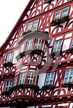 Picturesque half-timbered house with bay windows in Miltenberg, Germany photo