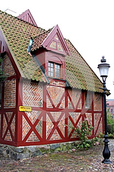 Picturesque half-timbered house in Ystad, Sweden photo