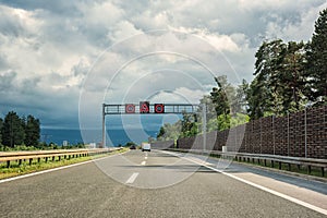 Picturesque highway in Croatia autocesta A, the main automobile way with pointers and road signs. Scenic daytime landscape with