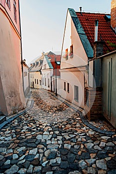 Picturesque historic narrow street with stone pavement in Tabor