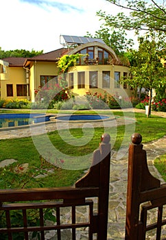 Picturesque house garden pool gates