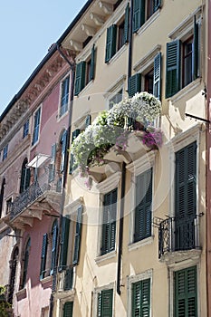 Picturesque Italian house with flowers on terrace